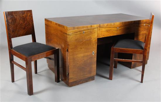 A Continental Art Deco walnut desk, W.4ft 10in. D.2ft 5in. H.2ft 6in.